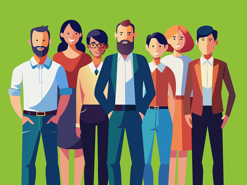 Eine Gruppe von Menschen steht zusammen und lächelt in die Kamera.